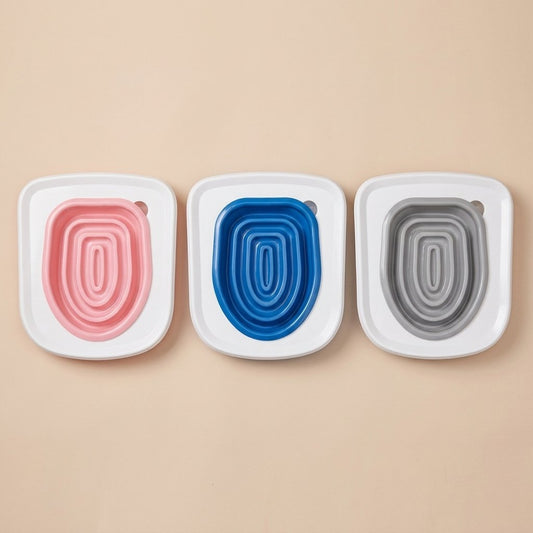 Casa Michi cat toilet trainer inserts in pink blue and gray on white frames, all colors