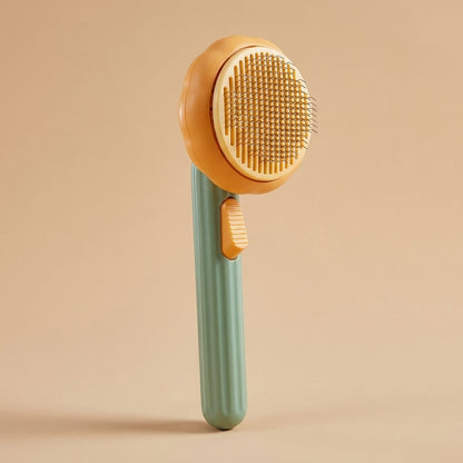 Sage green pumpkin cat brush three-quarter studio product shot
