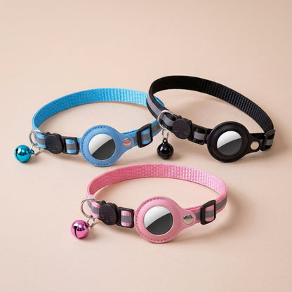 Blue pink and black reflective AirTag cat collars grouped with matching bells