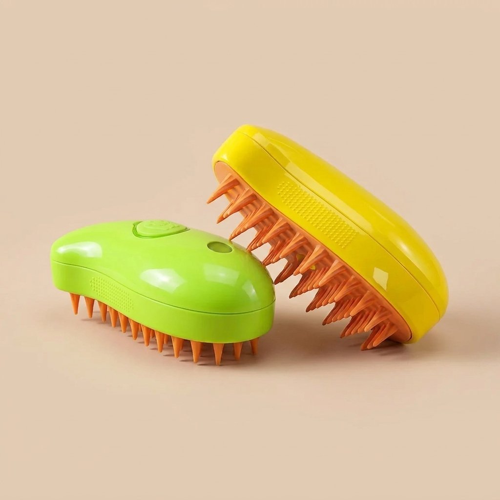 Lime green and yellow steamy cat brushes angled to show orange silicone bristles