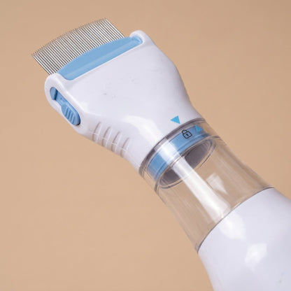 Electric flea comb detail angled view of metal comb teeth and lock arrow marking