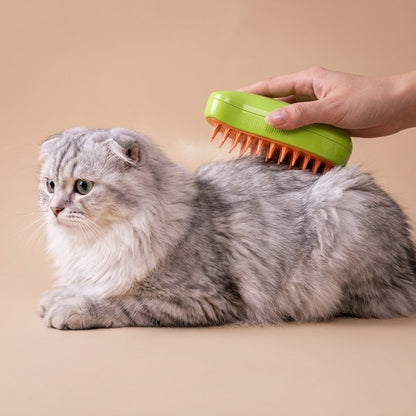 Hand brushing a fluffy grey cat with a lime green steamy brush, orange bristles on the coat
