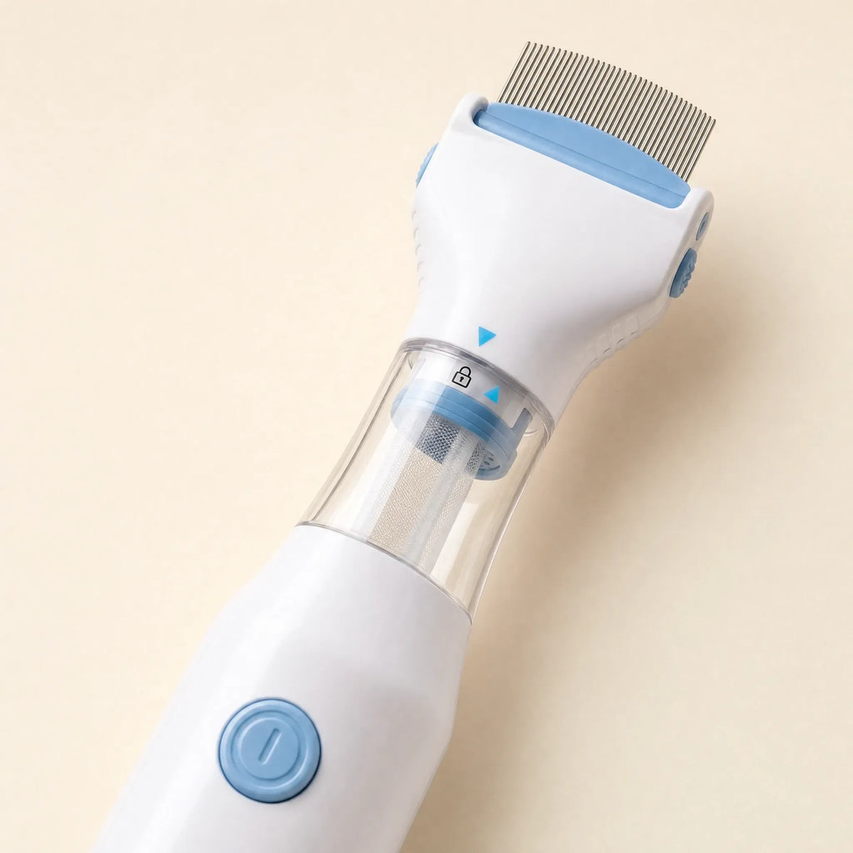 Close-up of the white and light blue electric flea comb showing fine metal teeth, clear collection chamber and round power button