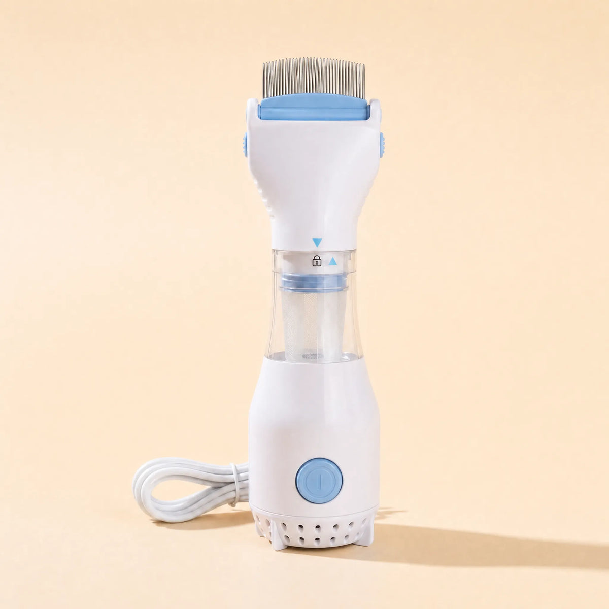 White and light blue electric flea comb standing upright on a cream background with metal comb teeth, clear collection chamber, round power button and coiled cord
